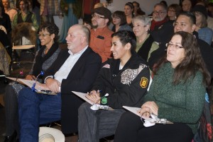 A diverse panel of distinguished Southern Arizona residents watches a pitch at the Southern regional event.
