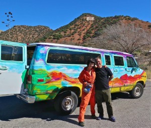 Comedian Doug Stanhope and fellow Bisbee resident Gretchen Baer pose with the van he donated to "Paint Your Town!"